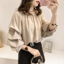 Blusa de mujer con mangas abullonadas 3