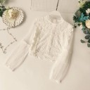 Blusa de mujer con mangas transparentes. 3