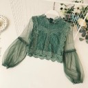 Blusa de mujer con mangas transparentes. 6
