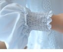 Blusa elegante da donna con maniche lunghe e ampie e decorazione in pizzo Collo rotondo Polsini arricciati con volant Poliestere e spandex 6