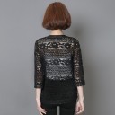 Blusa in pizzo da donna con davanti aperto e maniche a tre quarti. Orlo in pizzo ondulato. Cotone, poliestere e spandex. 4