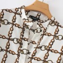 Blusa longa feminina com padrão 4