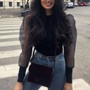 Blusa negra para mujer con largas mangas transparentes y abullonadas Cierre de botones Escote redondo Puños anchos Poliéster y algodón 2