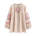 Blusa primaverile da donna con motivo floreale su maniche lunghe e ampie Scollo con cordoncino e frange Cuciture decorative Cotone e lino 2