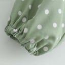 Bluză damă verde deschis cu buline albe Decolteu adânc în V cu legare în față Croi scurt Mâneci lungi cu elastic Poliester 6