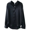 Bluză elegantă de damă din satin fin, cu mâneci lungi. Cămașă lejeră cu guler. Top elegant cu nasturi, atât pentru serviciu 1