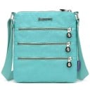 Bolsa crossbody feminina plana de nylon Três bolsos frontais com fecho Bolsos interiores Alça ajustável Dimensões 21 x 25 x 3 cm 10