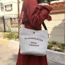 Bolsa de hombro para mujer en forma de saco de lona Gris claro con correa marrón Saco interior ajustable Bolsillo con cremallera Dimensiones 23 x 23 x 2