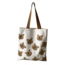 Bolsa de ombro em tela para senhora com estampa divertida Fecho com zip Pocket interior Alças largas castanhas Dimensões 34 x 38 cm Tela 3