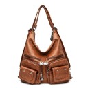 Bolsa de ombro feminina em pele sintética Duas bolsas frontais com aba Bolsos com fecho Acessórios metálicos nos puxadores Dimensões 2