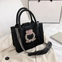 Bolsa de senhora de mão com alça em corrente de pele sintética Acolchoado em ondas Fecho decorativo com pedras Duas alças 22 x 17 x 8 cm 1