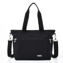 Bolsa de senhora de ombro em poliéster Duas alças Alça removível com mosquetões Bolso frontal com fecho Dimensões 32 x 27 x 17 cm 2