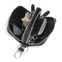 Bolsa para chaves e pequenos objetos em pele genuína Dois compartimentos com fecho Mosquetão com argola Superfície texturizada Dimensões 4
