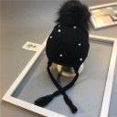 Bonnet d'enfant avec pompon et perles 8