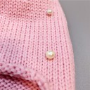 Bonnet d'enfant avec pompon et perles 7