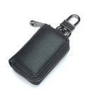 Bőrpénztárca kulcsoknak Fémkarabina bőrpánton Cipzáras záródás a perem körül Zsugorodott felület Kis méret 8 x 2,5 x 5 cm 1