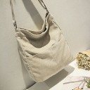 Borsa a tracolla in velluto a coste 31 x 40 x 11 cm Borsa con tracolla lunga Due tasche anteriori Chiusura a bottone Velluto a coste 1