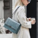 Borsa da donna con motivo in pelle di serpente M1567 1