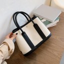 Borsa da donna in tela a mano Forma rigida Due manici corte Bordo nero Chiodo metallico sul davanti Dimensioni 30 x 22 x 15 cm 5