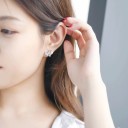 Boucles d'oreilles à clou pour femmes en forme de nœud 2