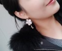 Boucles d'oreilles créoles avec fleur 11