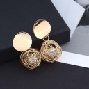 Boucles d'oreilles Élégantes Perle dans un Pelotons 1