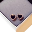 Boucles d'oreilles en forme de cœur avec des pierres 5
