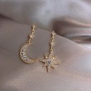 Boucles d'oreilles pendantes femme lune et étoile 1