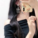 Boucles d'oreilles pendantes pour femmes en croix 1