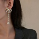 Boucles d'oreilles pendantes pour femmes en forme de nœud 3