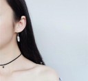 Boucles d'oreilles pendantes pour femmes en forme de plume 2