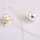 Boucles d'oreilles pour femmes avec des fleurs 9