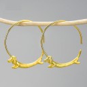 Boucles d'oreilles rondes pour femmes avec un blaireau 5