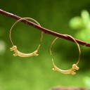 Boucles d'oreilles rondes pour femmes avec un blaireau 2