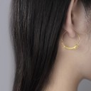 Boucles d'oreilles rondes pour femmes avec un blaireau 3