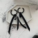 Boucles d'oreilles rondes pour femmes avec un nœud 2
