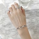 Bracciale aperto da donna con anelli 4