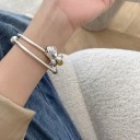 Bracciale aperto da donna con fiore 4