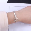 Bracciale aperto da donna con forbici 6