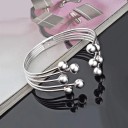 Bracciale aperto da donna con palline 2