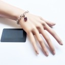 Bracciale da donna con grandi anelli e cuore 1