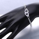 Bracciale da donna con palline e catene 1