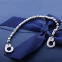Bracciale da donna con palline e catene 2