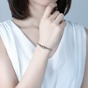 Bracciale regolabile da donna con palline 1