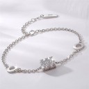 Bracelet en chaîne pour femmes avec des anneaux et une perle 1
