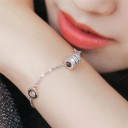 Bracelet en chaîne pour femmes avec des anneaux et une perle 2