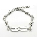Bracelet en fil de fer barbelé avec des lames 2