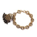 Bracelet féminin avec pompon 1