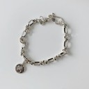 Bracelet femme avec pendentifs 3