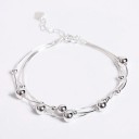 Bracelet femme avec perles P135 1